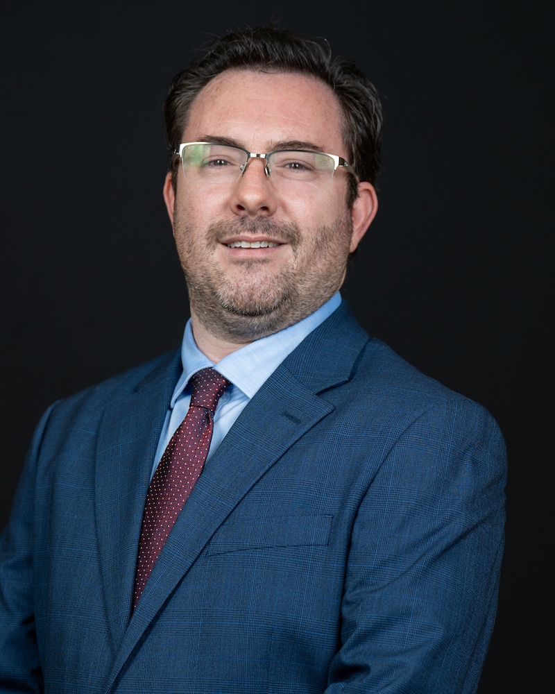 Headshot of John Braud