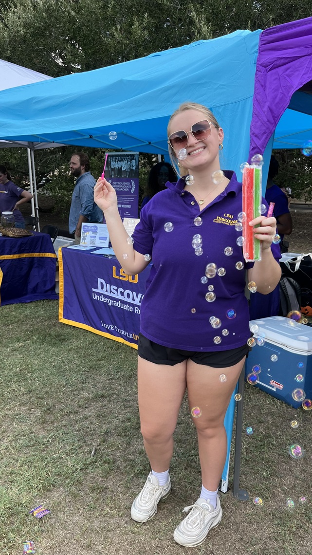 Photo of student at an outreach event